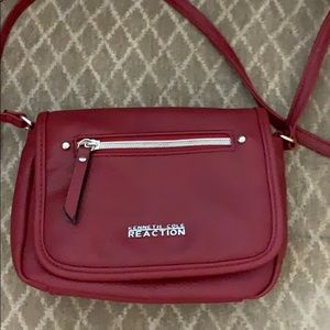 Red Kenneth Cole purse never used.